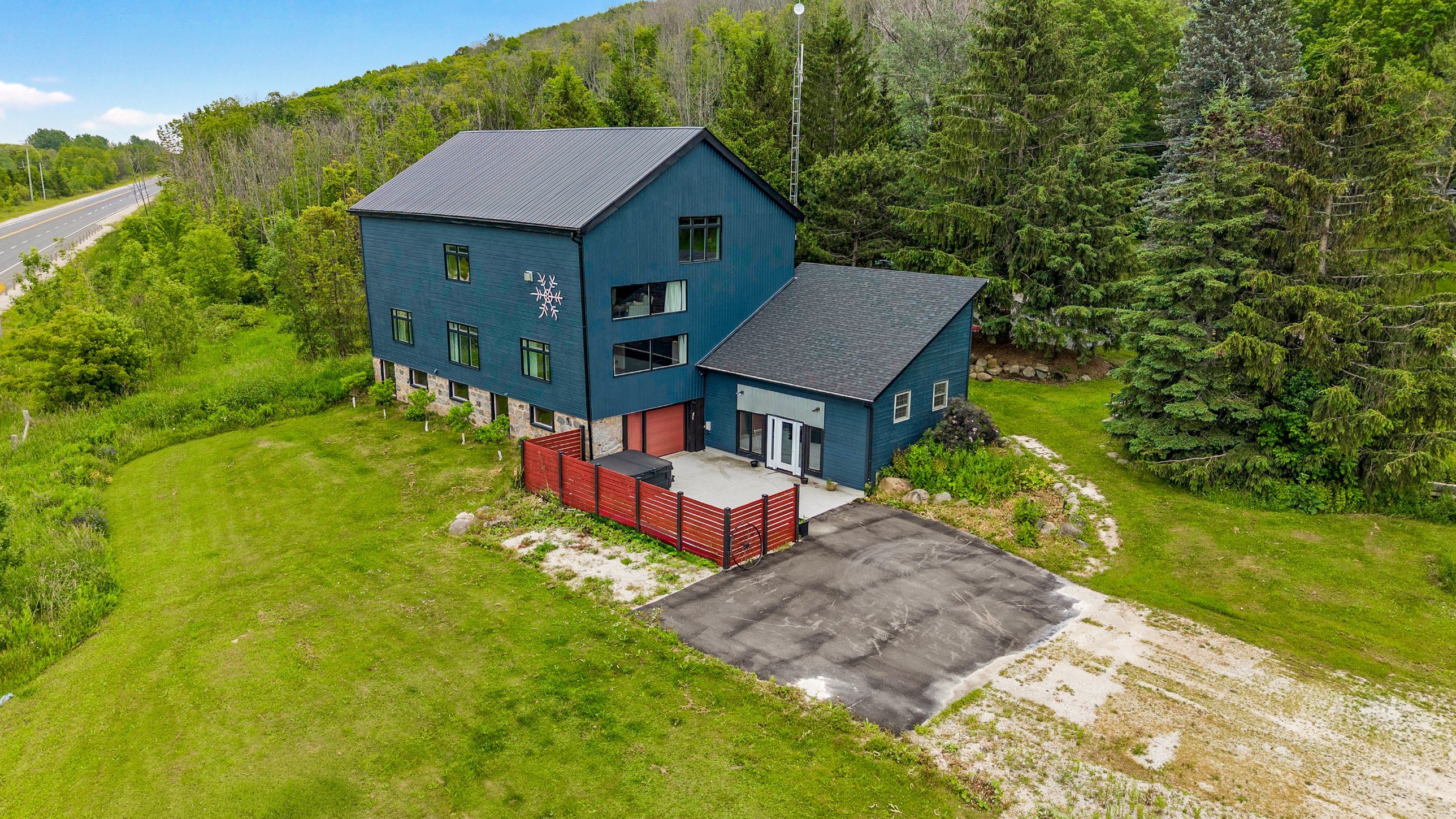 Existing aerial photograph of the barn and grounds at 121 Old Highway 26